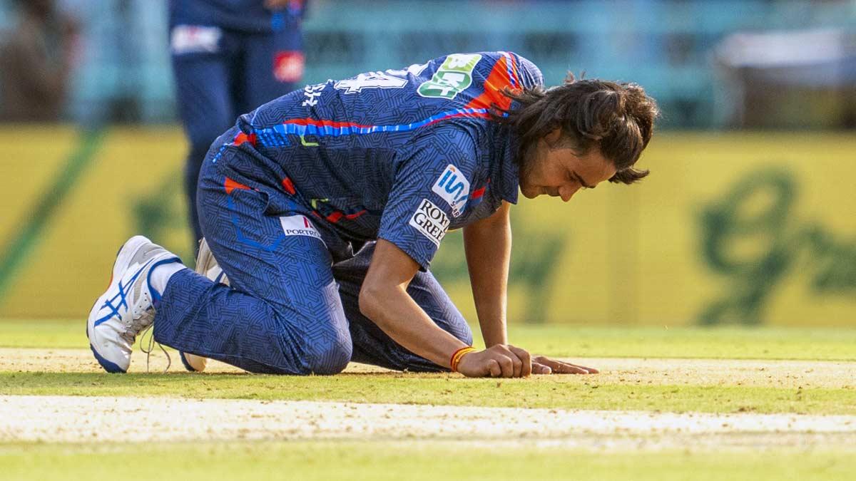 Digvesh Rathi celebrates the wicket of Jos Buttler.
